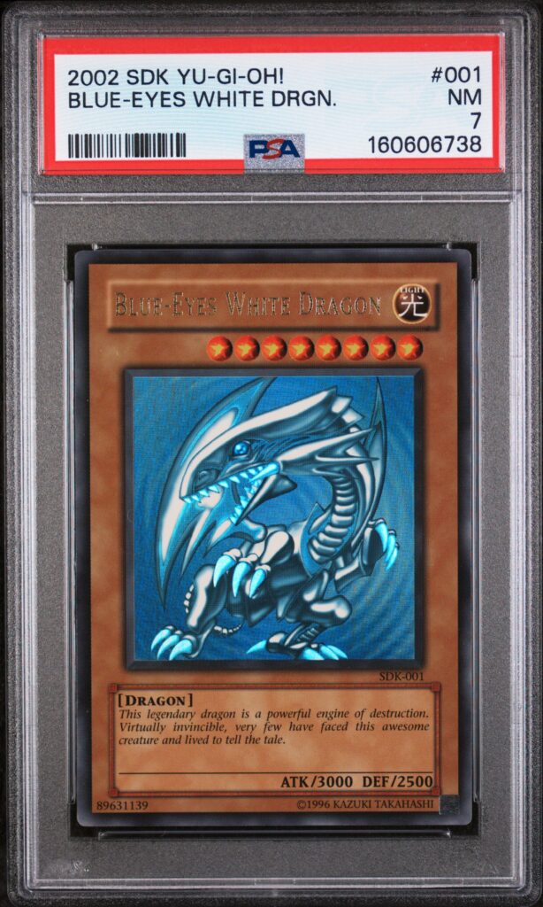 Blue-Eyes White Dragon (SDK-001) - PSA NEAR MINT 7 - Front